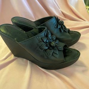 Born Beautiful! Feminine floral detail on Born leather mules with 4 1/2" wedge